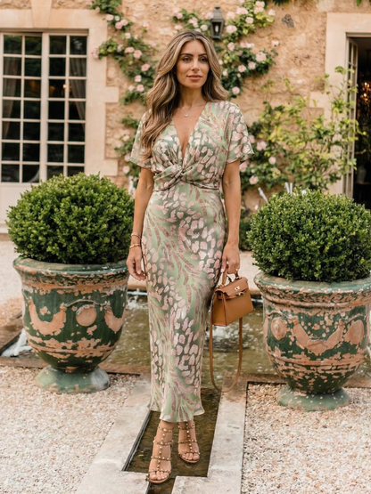 Coralie | Abstrakt bedrucktes Midi-Kleid mit V-Ausschnitt und Taillen-Twist