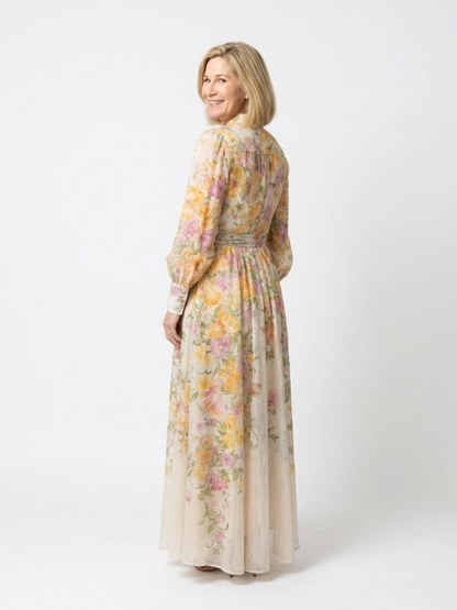 Petronella | Maxi-Kleid mit Blumenmuster, transparenten langen Ärmeln, Gürtel und Knopfleiste