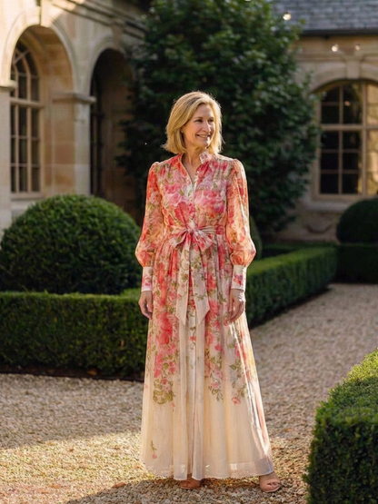 Petronella | Maxi-Kleid mit Blumenmuster, transparenten langen Ärmeln, Gürtel und Knopfleiste